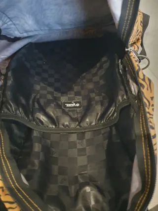 Mochila Vans estampado animal print