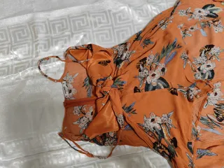 Mono corto estampado floral naranja