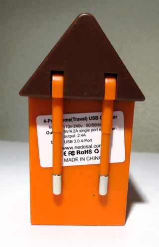 Caricatore da viaggio a forma di casa con 4 porte USB