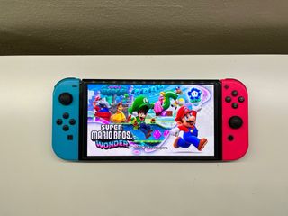 Nintendo Switch OLED+Super Mario Wonder+Accessori