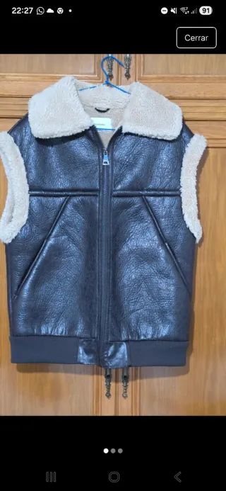 Chaleco doble faz negro y beige