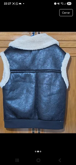 Chaleco doble faz negro y beige