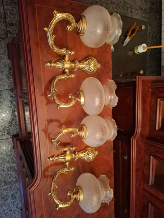 Apliques de pared dorados y cristal