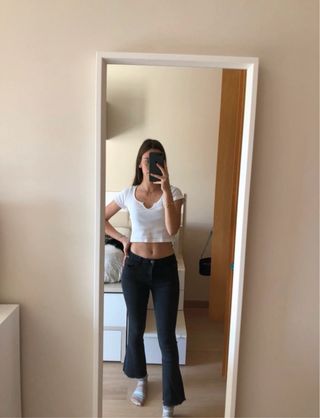 Pantalones vaqueros negros acampanados