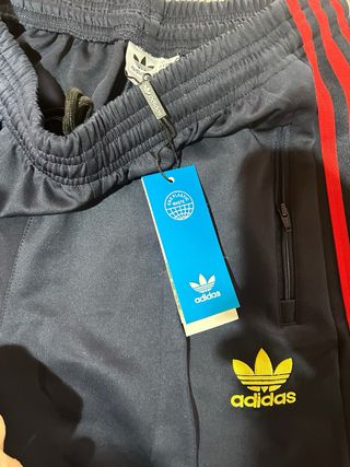 Tuta Adidas blu, bianca e rossa