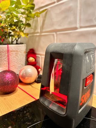 Nivel láser SKIL con trípode