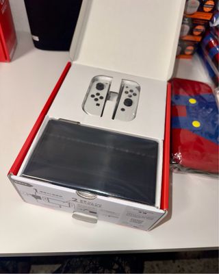 Nuovo Nintendo Switch OLED + Custodia + Protezione