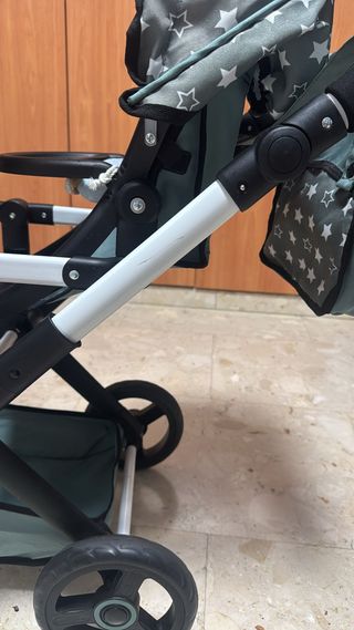 Passeggino gemellare per bambole con stampa a stelle