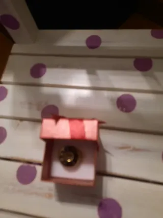 Anillo negro y dorado