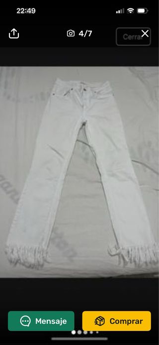 Pantalón blanco con flecos