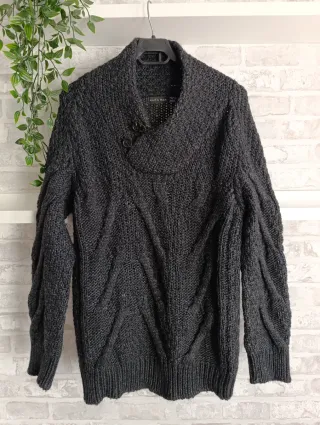 Jersey trenzado gris de Zara