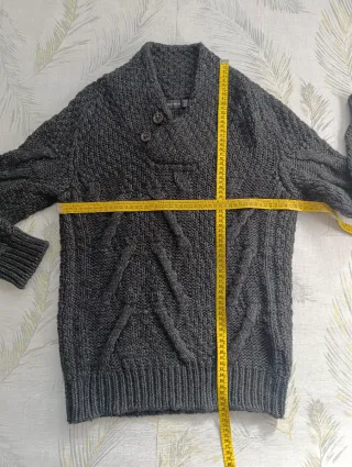 Jersey trenzado gris de Zara