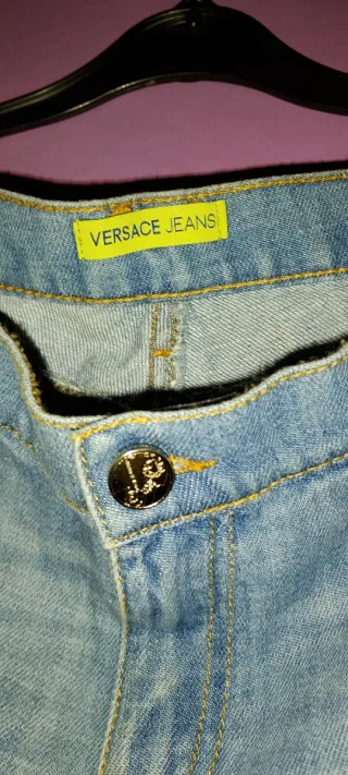 Jeans Versace a zampa taglia in foto nuovi