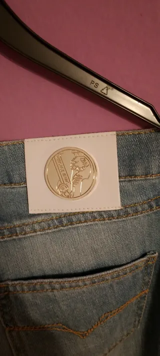 Jeans Versace a zampa taglia in foto nuovi