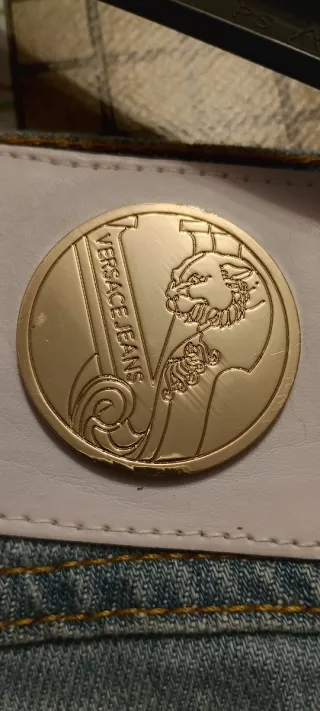 Jeans Versace a zampa taglia in foto nuovi