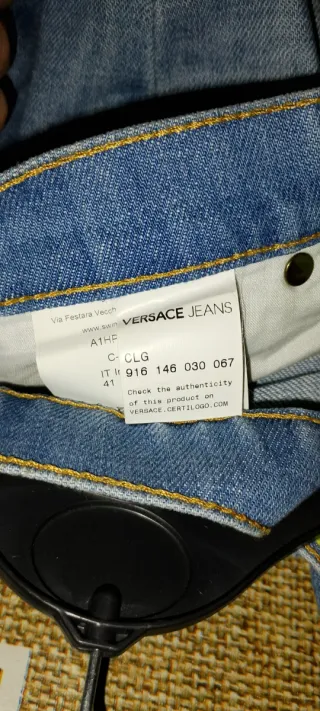 Jeans Versace a zampa taglia in foto nuovi