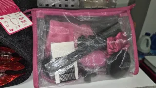 Neceser transparente rosa y negro