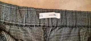 Pantalón de vestir gris a cuadros. Gales