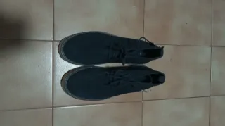 Botines de piel azul marino nuevo con etiqueta.