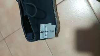 Botines de piel azul marino nuevo con etiqueta.