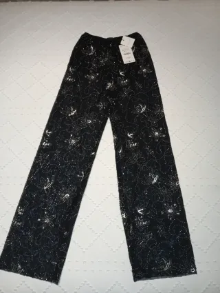 Pantalón fiesta Zara lentejuelas transparente