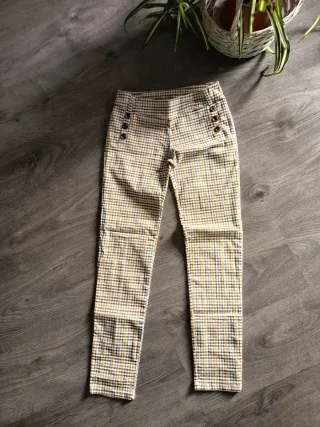 Pantalones de cuadros beige y amarillo