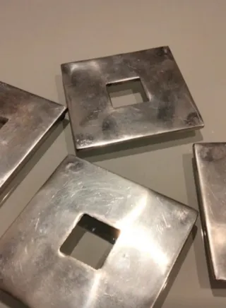 Posavasos metálicos plateados