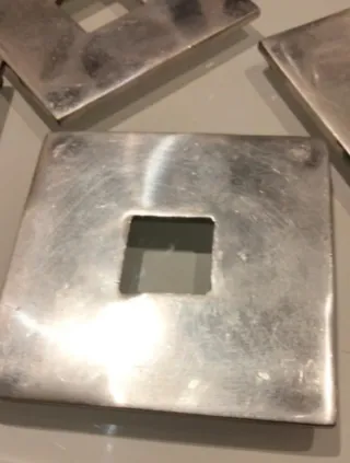 Posavasos metálicos plateados