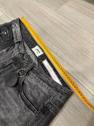 Amicci Jeans Flared Neri Strappati