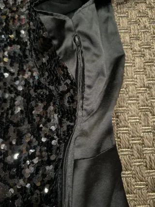 Top peplum negro lentejuelas