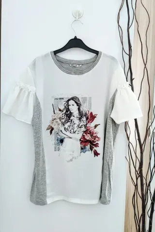 Bonita camiseta manga volante en L 40