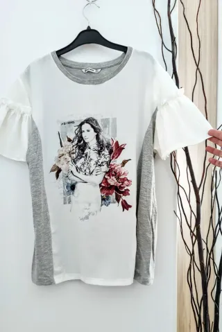 Bonita camiseta manga volante en L 40