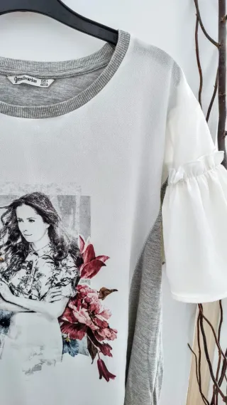 Bonita camiseta manga volante en L 40