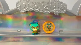 Disney Doorables Figura y Moneda