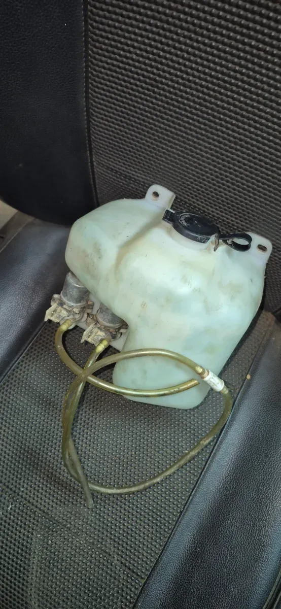 Botella limpia parabrisas Nissan Patrol