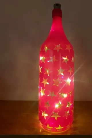 Lampada bottiglia stelle rosse oro natalizia