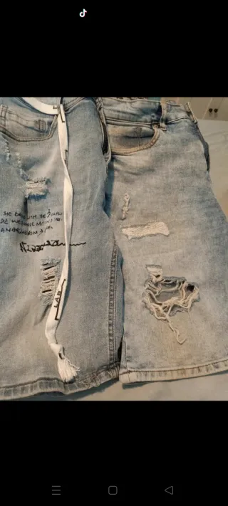 Pantalones cortos vaqueros rotos hombre