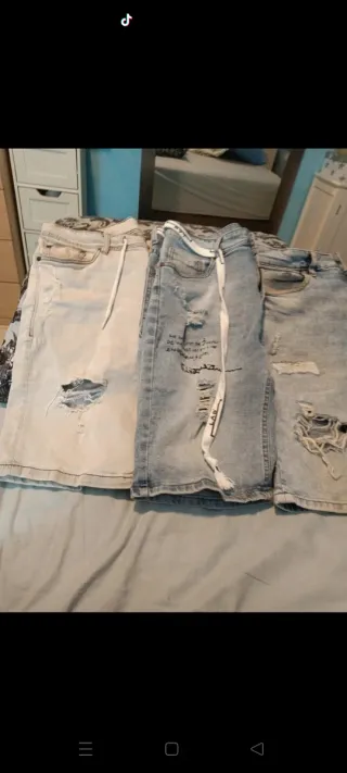 Pantalones cortos vaqueros rotos hombre