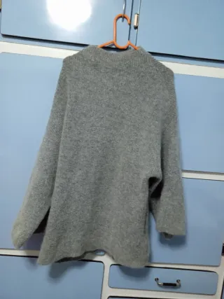 Jersey cuello alto mangas anchas