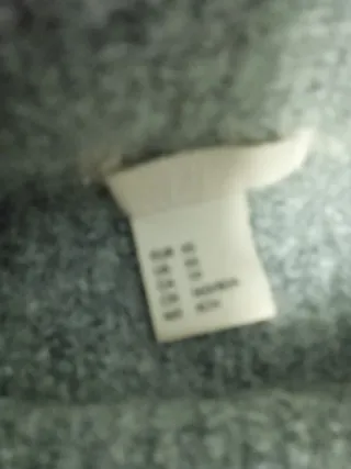 Jersey cuello alto mangas anchas