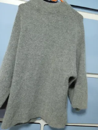 Jersey cuello alto mangas anchas