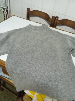 Jersey cuello alto mangas anchas