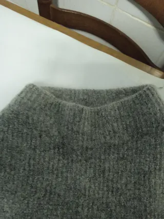 Jersey cuello alto mangas anchas