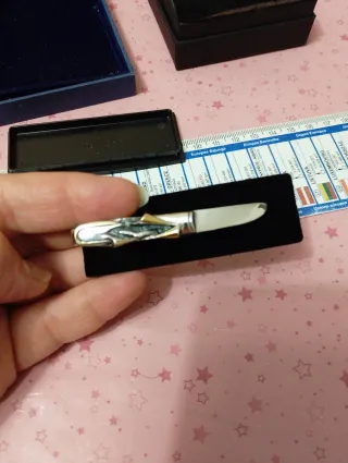 Fermacravatta vintage oro e argento