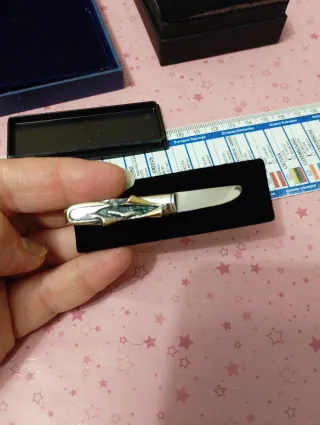 Fermacravatta vintage oro e argento