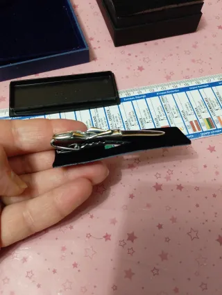 Fermacravatta vintage oro e argento