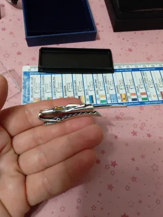 Fermacravatta vintage oro e argento