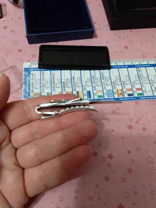 Fermacravatta vintage oro e argento