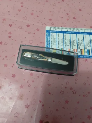 Fermacravatta vintage oro e argento