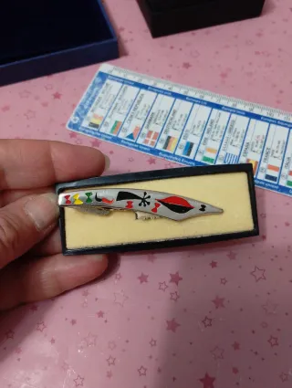 Fermacravatta vintage design colorato